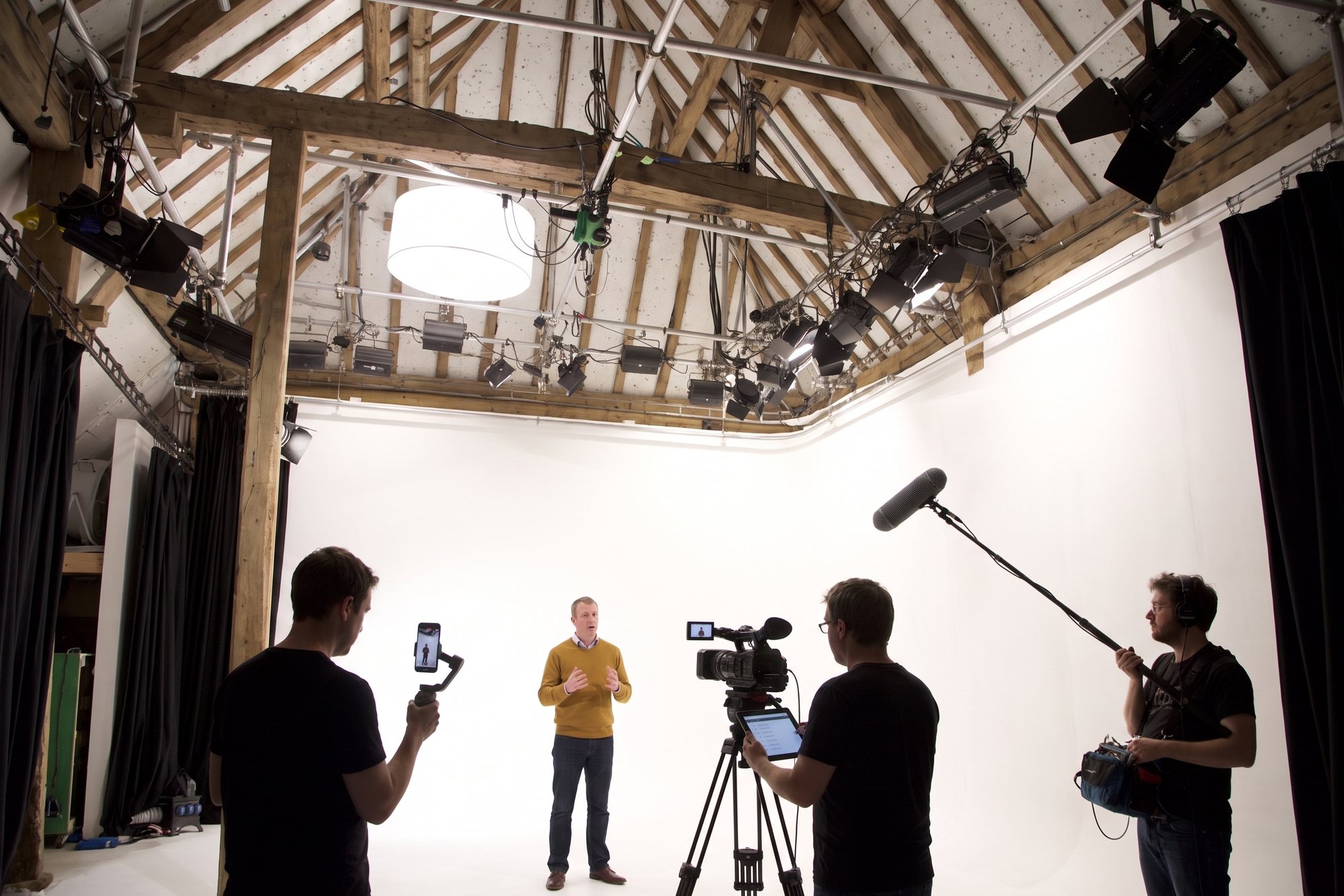 A content day on the cove: a founder to camera, a phone on a gimbal and a boom