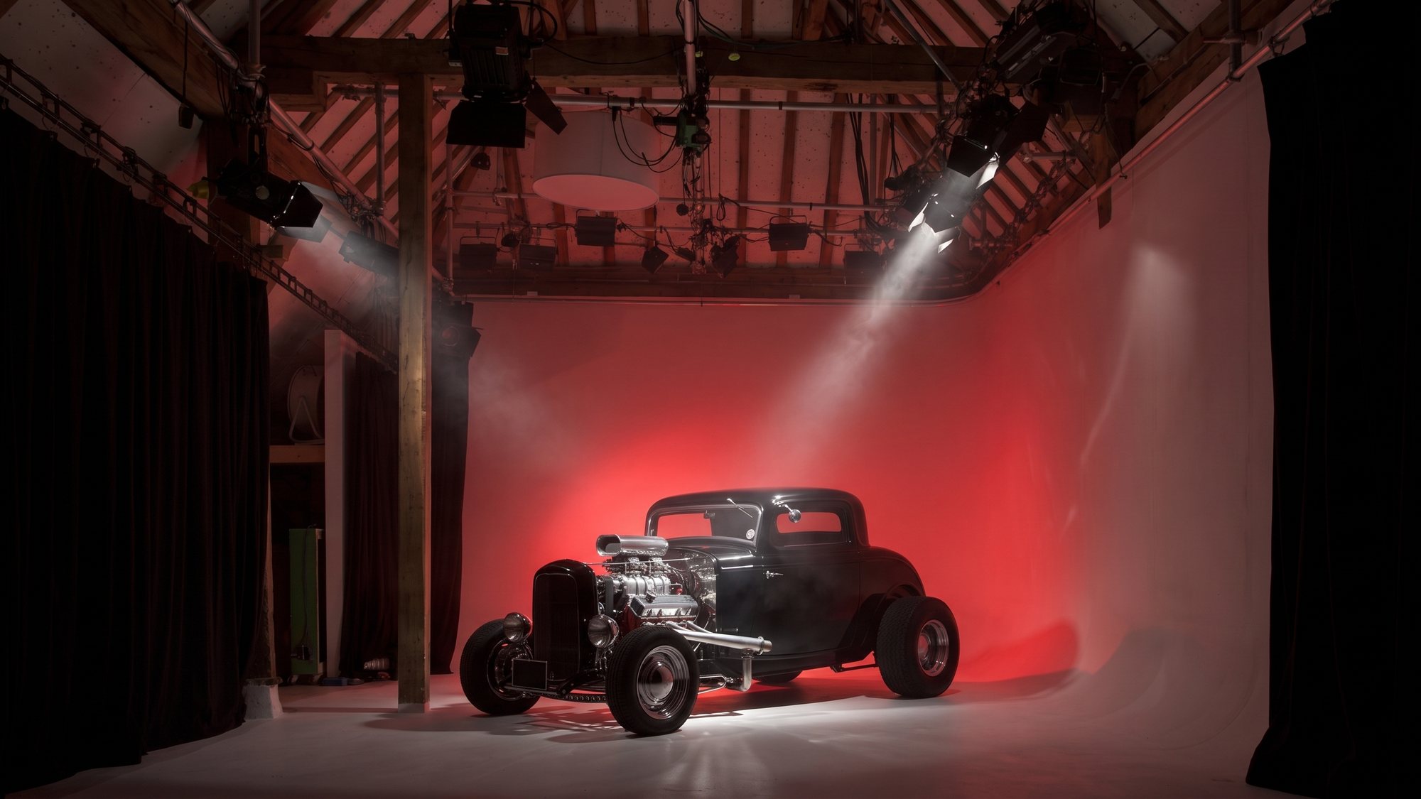 A hot rod on the cove under a red wash and a single hard light