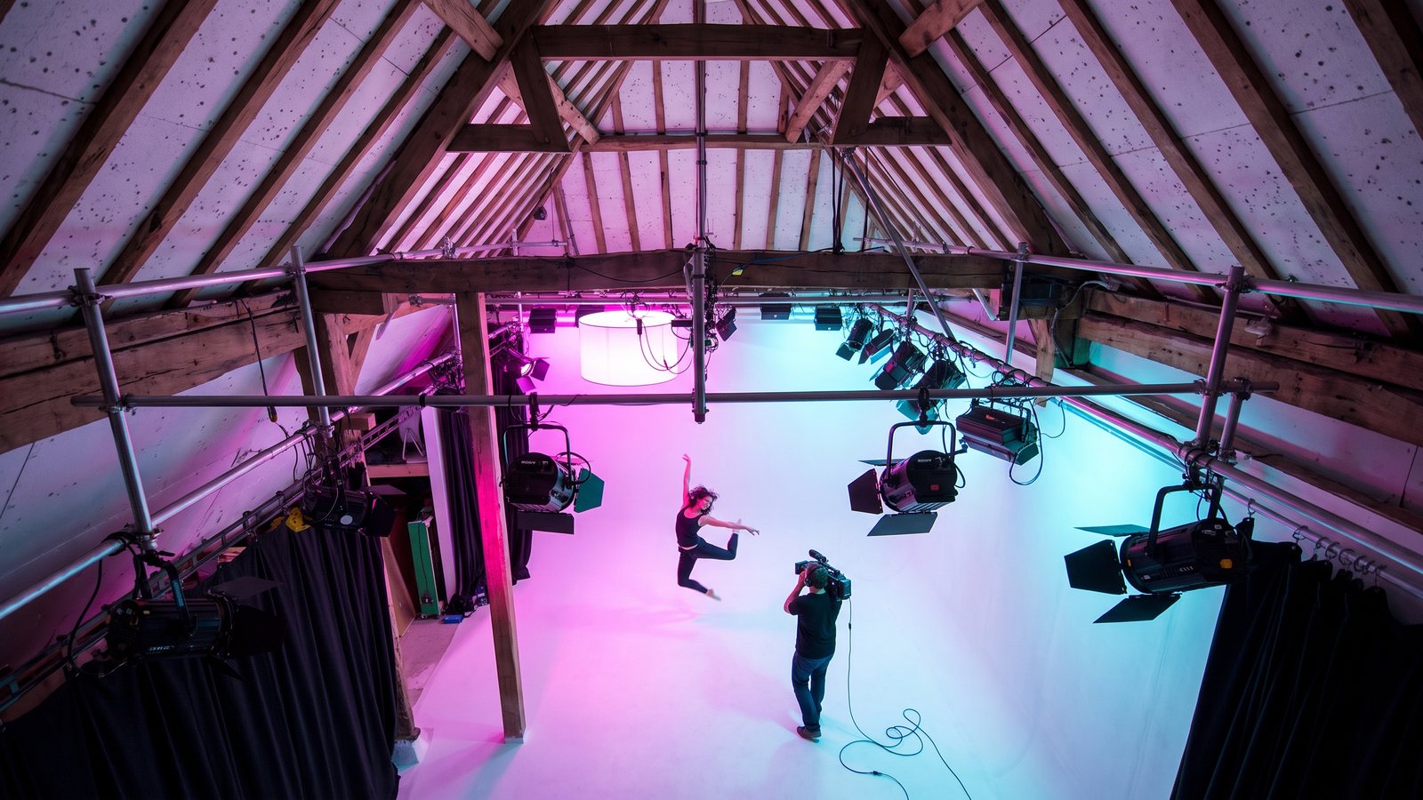 A music video on the White Space cove under magenta and cyan light, seen from above