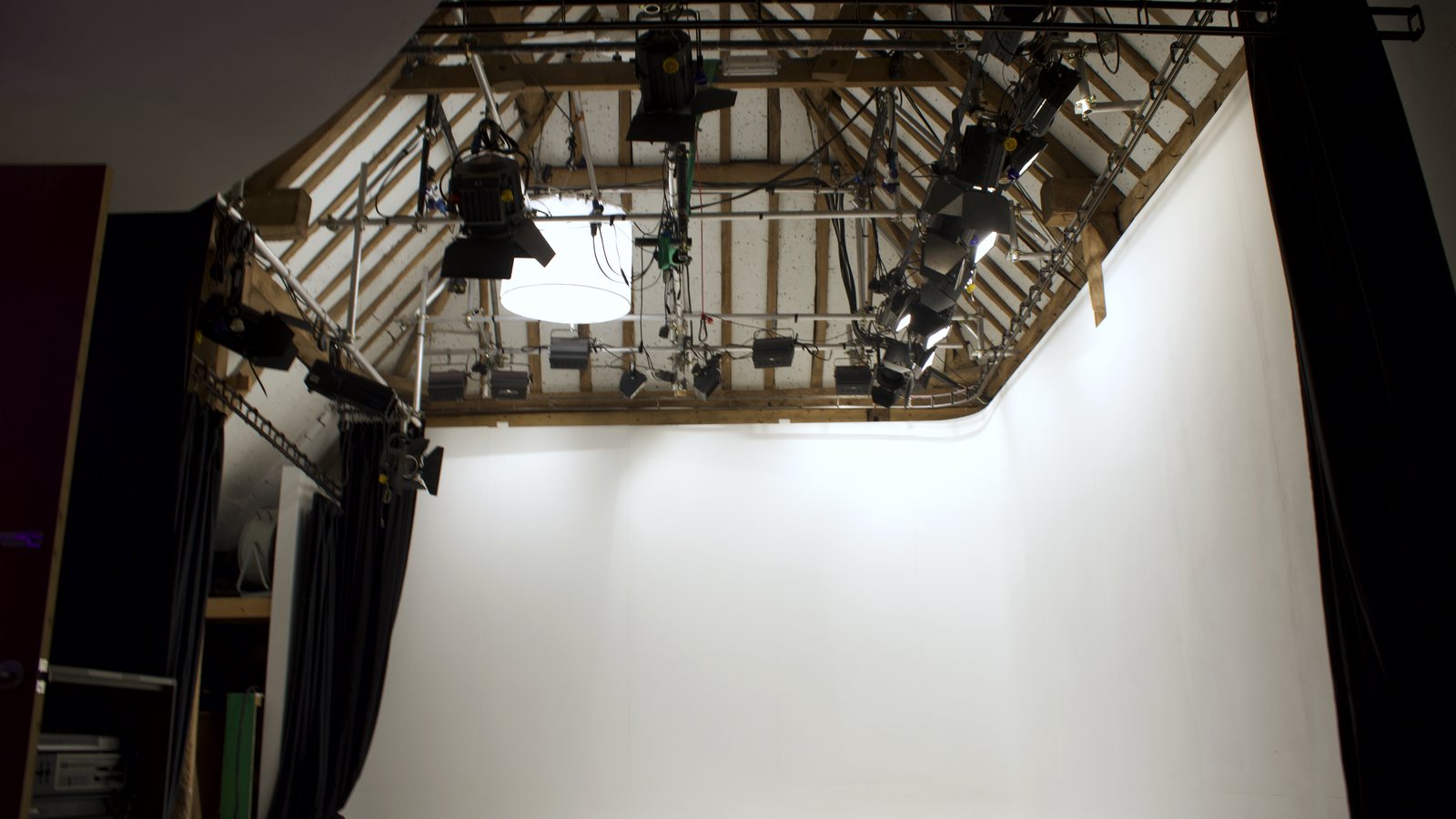 The White Space infinity cove lit white, seen from the studio floor