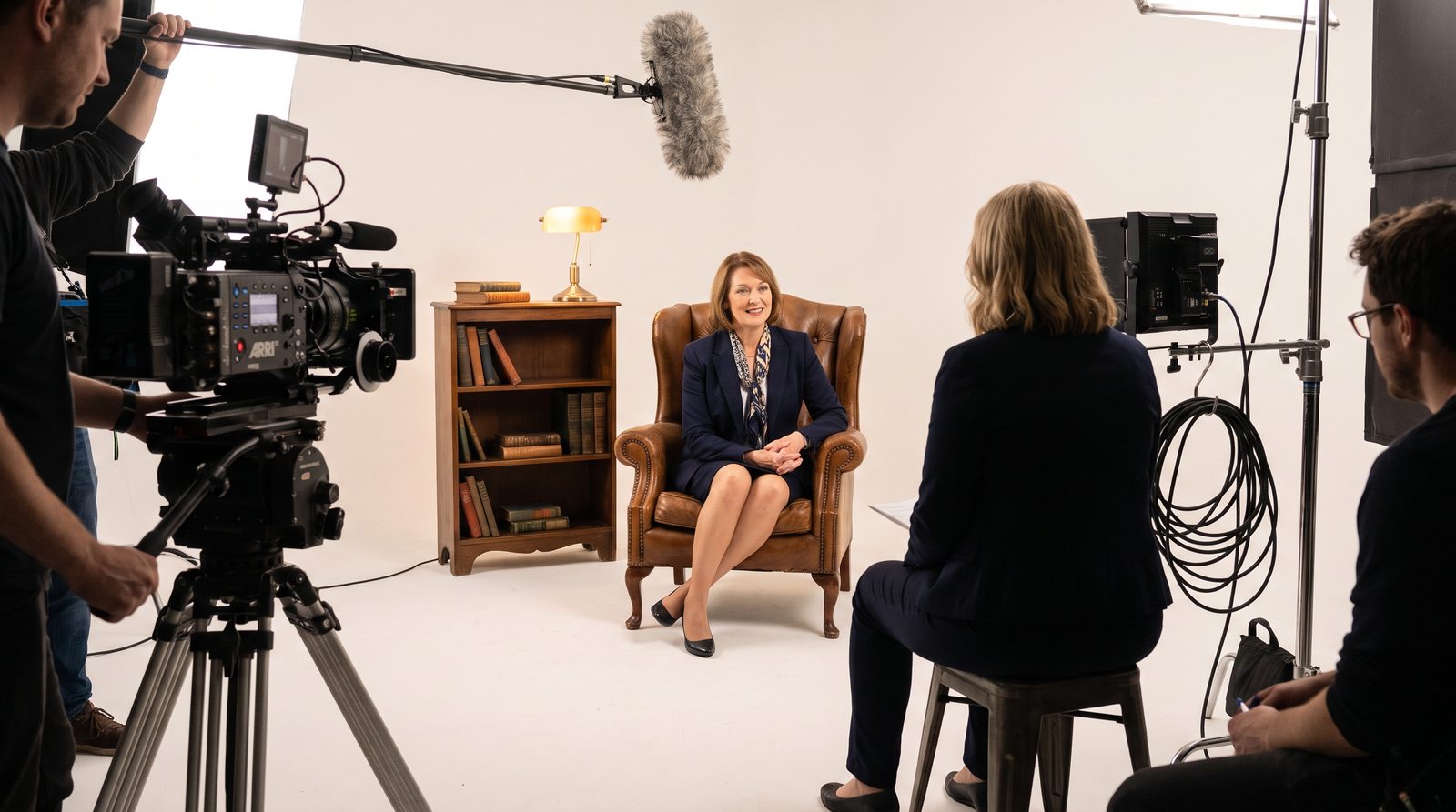 A documentary-style interview being filmed